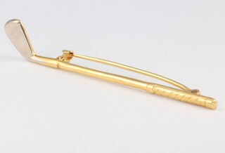 A 9ct yellow gold brooch in the form of a golf iron 60mm 2.8 grams 