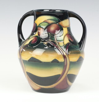 A Moorcroft Western isles pattern twin handled baluster vase, designed by Sian Leeper, impressed marks, dated 2006, monogrammed VZ, a second 19cm 