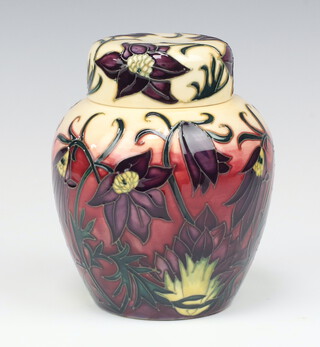 A Moorcroft Pasque Flower pattern cream ground ginger jar and cover, designed by Philip Gibson, impressed marks, dated 2000, monogrammed PM 16cm 