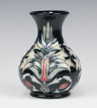 A Moorcroft Snakeshead pattern black ground baluster vase, designed by Rachel Bishop, impressed marks, dated '95, monogrammed MN, 16cm