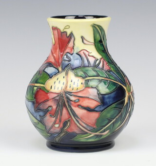 A Moorcroft Simeon pattern baluster vase, designed by Philip Gibson, impressed marks, monogrammed PM 15cm 