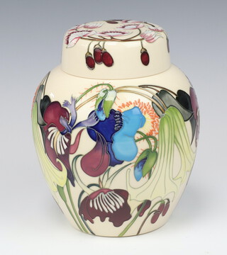 A Moorcroft Carousel cream ground ginger jar and cover, designed by Emma Bossons, dated 2012, signed, impressed marks 21cm  