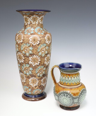 A Doulton Slaters oviform vase decorated with stylised flowers 40cm and a Doulton Lambeth jug decorated with stylised flower heads 18cm 