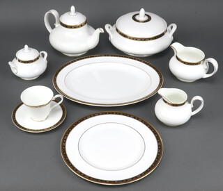 A Royal Doulton Monaco H5133 part tea and dinner service comprising 9 tea cups (all seconds), 8 saucers (1 second), a sugar bowl (second), sugar bowl lid, teapot (second), cream jug, milk jug (both seconds), 2 tureens and covers (both seconds), 10 side plates (8 seconds), 8 medium plates (7 seconds), 8 dinner plates (7 seconds), 2 vegetable dishes, 1 oval meat plate, 8 dessert bowls (1 second), 8 soup bowls (6 seconds) 