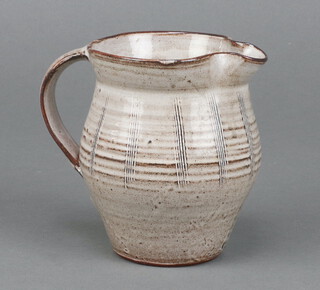 A David Leach studio pottery jug with incised decoration 11cm