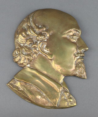 A gilt metal head and shoulders portrait plaque of William Shakespeare 17cm x 12cm 