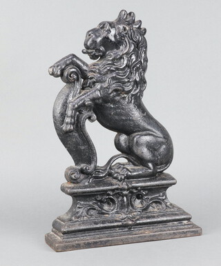 A Victorian cast iron door stop in the form of a rampant lion 39cm h x 26cm w x 7cm d 