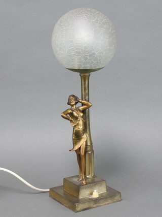 An Art Deco spelter table lamp  in the form of a standing lady by a lamp post with crackle glass shade, raised on a stepped base 48cm h x 13cm w x 13cm d 