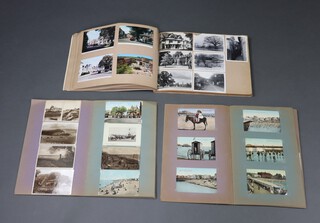 Three albums of 19th and 20th Century black and white and coloured postcards including Horsham, Sussex and Brighton scenes, approx. 310 