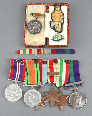 A group of 6 medals to 6083440 Private W.V Parker West Yorkshire Regiment, comprising 39-45 Star, Africa Star with clasp First Army, Italy Star, Defence and War medal together with Army RAF General Service medal George VI issue, 1 bar Palestine, a Methusa Company Rifle Club medal dated 1934, a ribbon bar, a Reconnaissance Corps Sweetheart brooch and an Italian embroidered badge