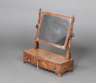 A 19th Century rectangular plate dressing table mirror contained in a mahogany frame on a bow front base fitted 3 drawers, raised on bracket feet 50cm h x 21cm w  