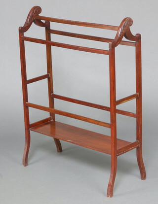 An Edwardian carved mahogany towel rail with undertier 183cm h x 75cm w x 26cm d 