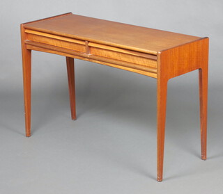 A mid-Century rectangular teak side table fitted 2 drawers, raised on square tapered supports 71cm h x 107cm w x 41cm d 