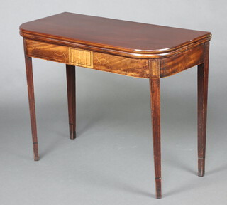 A 19th Century inlaid mahogany D shaped tea table raised on square tapered supports 73cm h x 94cm w x 45cm d 