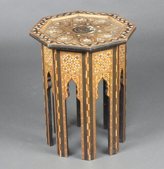 An octagonal Eastern inlaid mother of pearl and marquetry occasional table 52cm h x 41cm w x 41cm d 