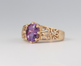 A yellow metal 9ct amethyst dress ring size M, 4.3 grams 