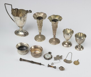 An Edwardian Georgian style silver cream jug Birmingham 1904, 2 egg cups, a spirit label, 2 mustards, minor items, weighable silver 200 grams 