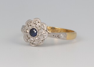 An 18ct yellow gold diamond and sapphire cluster ring 2.8 grams, size L 