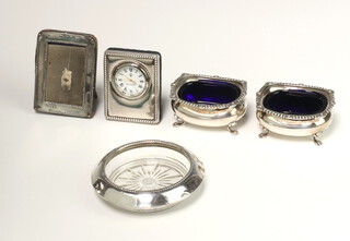 A silver salt Birmingham 1949, 1 other, a mounted dish, timepiece and frame, weighable silver 105 grams 