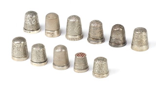 A silver thimble Birmingham 1910 and 10 others, 49 grams