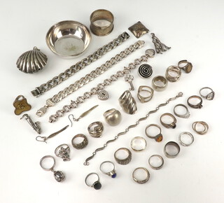 A silver bangle and minor silver jewellery, 432 grams