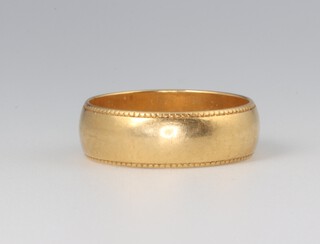 An 18ct yellow gold wedding band size M 1/2, 4.5 grams 