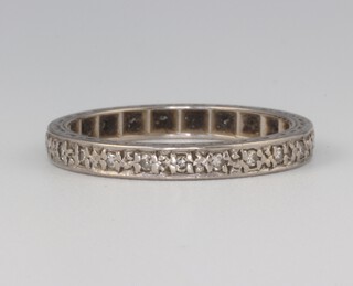 A white metal 18ct diamond eternity ring size P, 3.4 grams 