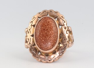 A yellow metal hardstone ring 5.9 grams, size L 