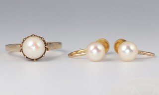 A 9ct yellow gold cultured pearl ring size Q and a pair of ditto ear clips 5.1 grams 