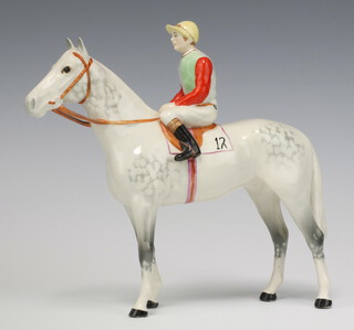 A Beswick figure of a horse and jockey no.1862 designed by Arthur Gredington 20.3cm, light dapple grey gloss