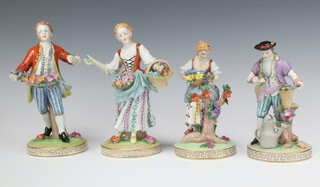 Two pairs of 20th Century Dresden figures of ladies and gentleman holding flowers, raised on circular Greek key pattern bases numbered G10890D 17cm, G10890D (chipped leaves 20cm),  E150886 17cm and  E150886 20cm (chipped leaves)   (4)