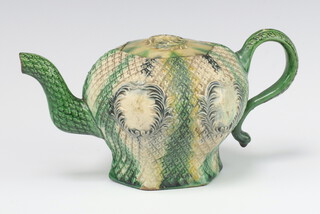 An 18th Century Staffordshire Whieldon style hexagonal teapot with moulded decoration and vacant cartouches, on a hexagonal base 10cm 