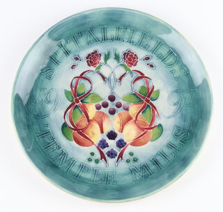 A Moorcroft year plate dated 1991, decorated "Spitalfields Temple Mills", designed by Sally Tuffin, 22cm 