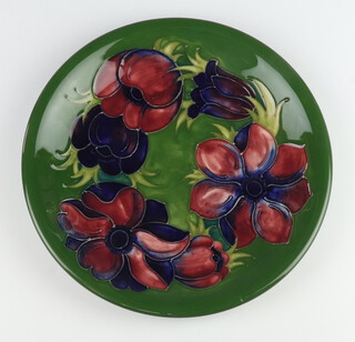 A Moorcroft plated decorated "Anemone" on a green ground impressed marks 25.5cm 