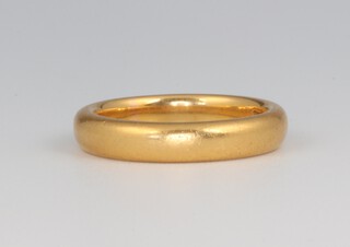 A 22ct yellow gold wedding band size K 1/2. 6.5 grams 