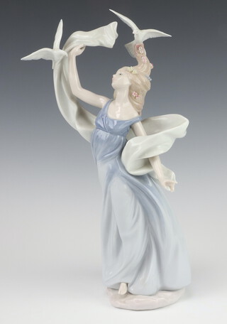 A Lladro Inspiration Millennium 1999 figure of a standing lady with doves 6570, 35cm, boxed