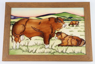 A Moorcroft tile decorated "Limousin Bulls", designed by Kerry Goodwin, impressed marks dated 2016, no.12/30 20cm x 31cm 