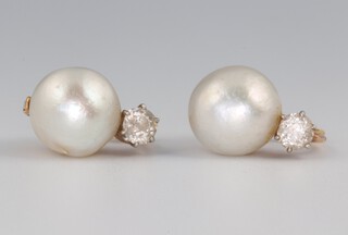 A pair of French 18ct yellow gold pearl and diamond pierced ear clips, the diamonds each 0.25ct, the pearls each 10mm, 6.1 grams 