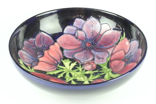 A Moorcroft deep bowl decorated "Anemone" 3494, impressed marks 26cm 