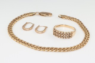 A 9ct yellow gold flat link bracelet 18cm, a ditto ring size Q and a pair of earrings 6.7 grams 