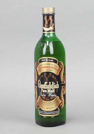 A 1980's bottle of Glenfiddich over 8 years pure malt whisky, distilled in hand beaten pot stills  