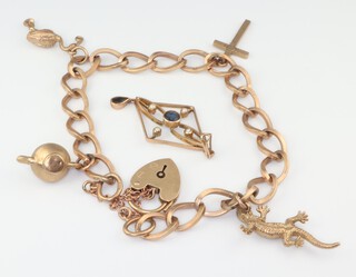 A 9ct yellow gold charm bracelet 18cm, 17.4 grams together with a gem set pendant 