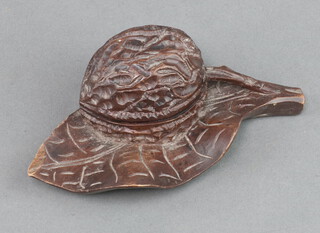 A Victorian carved wooden inkwell in the form of a walnut and leaf 6cm x 13cm x 7cm (chip to leaf)