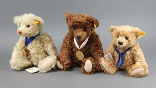 A Steiff 2004 Olympic Games teddybear with medal together with a 2005 ditto, a Steiff Teddy News bear 654541  