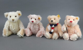 A Steiff Tennis teddybear 654572 23cm and 3 other Steiff bears 654558 26cm, 654701 30cm and 654565 23cm 