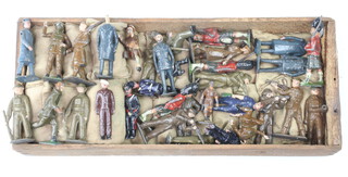 A collection of lead figures including airmen and sand bags 