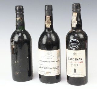 A bottle of  Sandeman 1997 Silver Jubilee Port, a bottle of 1977 Smith Woodhouse and Co Vintage Port and a bottle of Graham's 1977 port (label loose) 