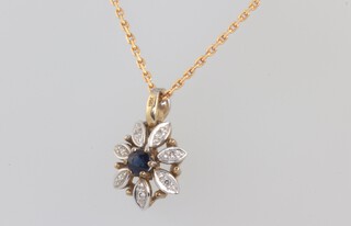 A 9ct yellow gold necklace 40cm together with a gem set yellow metal 375 pendant 2.6 grams 