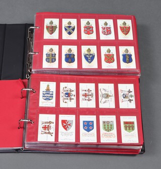 Wills cigarette cards, 2 Glen binders of mainly heraldic sets, Arms of Public Schools, Arms of The Bishopric, Arms of Companies, Borough Arms etc  