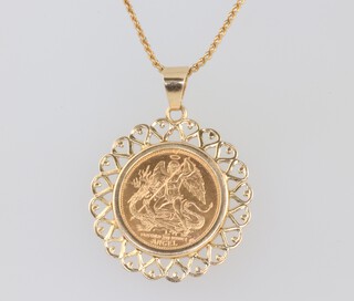 A 20th of an ounce Angel Isle of Man coin 1988 in a 9ct yellow gold mount, gross 2.6 grams on a gilt chain 